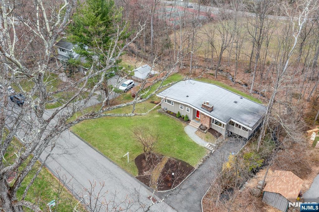 27 Bear Mountain Road Ringwood, NJ 07456 - Photo 47 of 47 an aerial view of a backyard with outdoor space