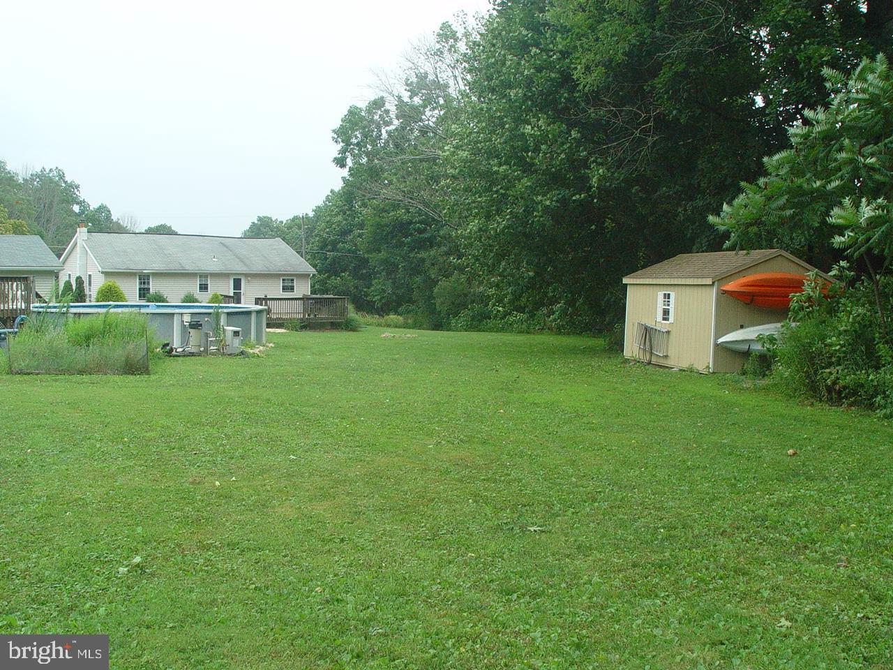 71 Tamanend Road Quakake, PA 18245 - Photo 2 of 12 BACK YARD FOR GET TOGETHERS OR JUST SIT QUITELY.