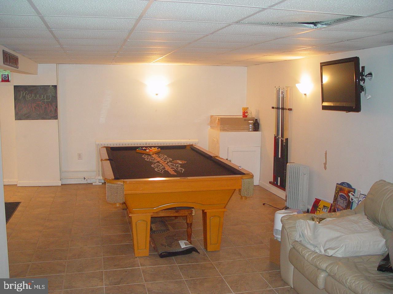 71 Tamanend Road Quakake, PA 18245 - Photo 9 of 12 THE "MAN CAVE" HEATED, WELL LIGHTED, BAR AREA,TV
