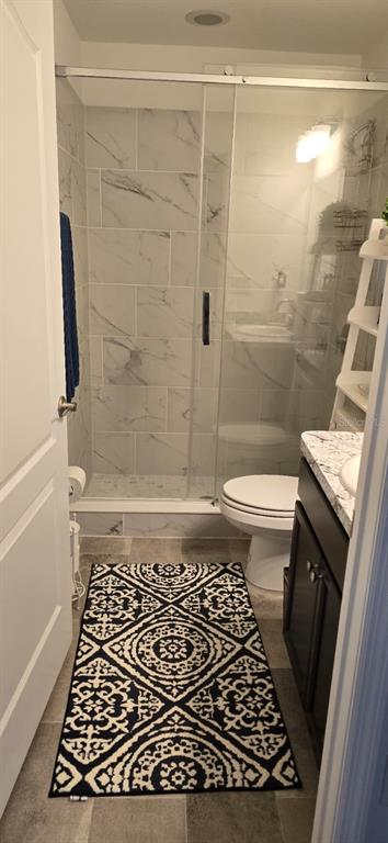 1108 Caloosa Ridge Way Babson Park, FL 33827 - Photo 14 of 29 a bathroom with a shower