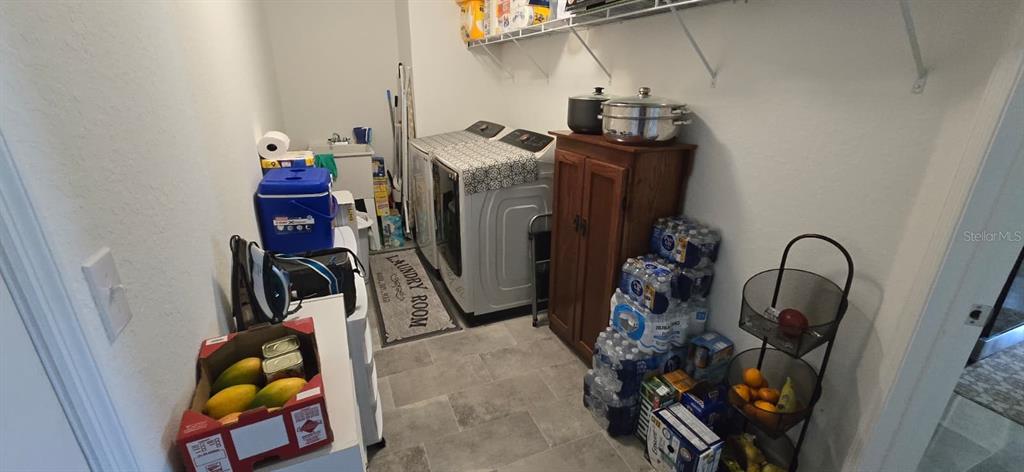 1108 Caloosa Ridge Way Babson Park, FL 33827 - Photo 21 of 29 a view of storage and utility room