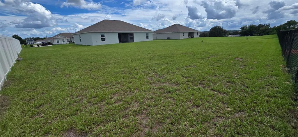 1108 Caloosa Ridge Way Babson Park, FL 33827 - Photo 24 of 29 a house view with a garden space