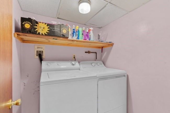 53 Windsor Street Everett, MA 02149 - Photo 11 of 20 a utility room with dryer and washer