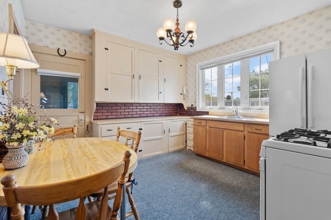 53 Windsor Street Everett, MA 02149 - Photo 2 of 20 a very nice looking dining room with a large window