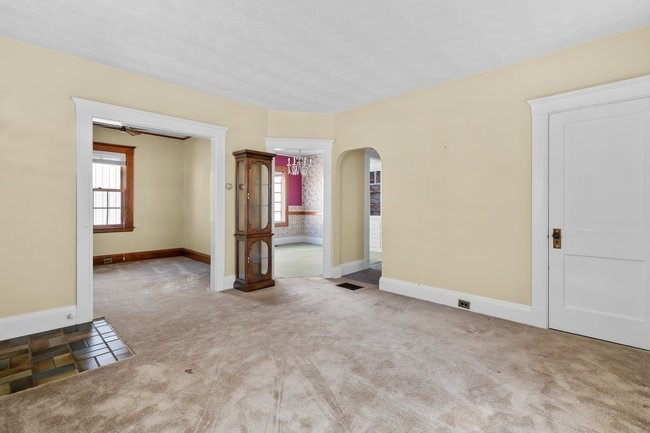 53 Windsor Street Everett, MA 02149 - Photo 6 of 20 an empty room with windows