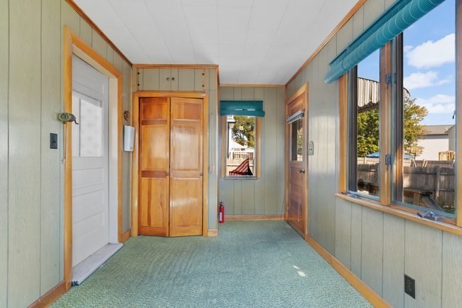 53 Windsor Street Everett, MA 02149 - Photo 10 of 20 a view of hallway with windows