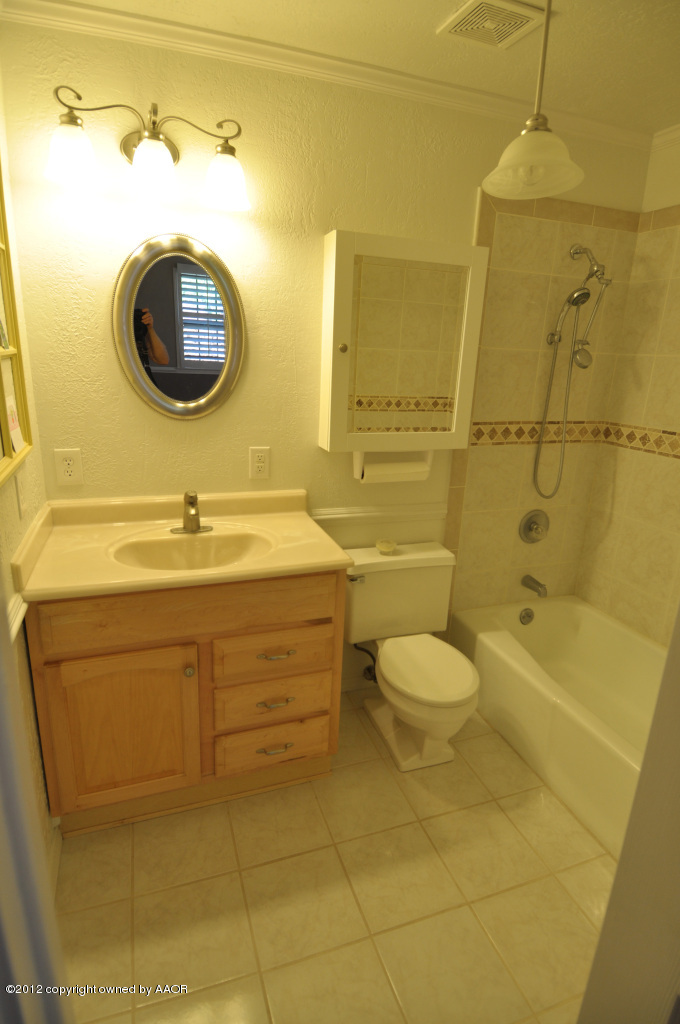 4236 Camp Lane Amarillo, TX 79110 - Photo 7 of 26 "Her" bath in master bedrm