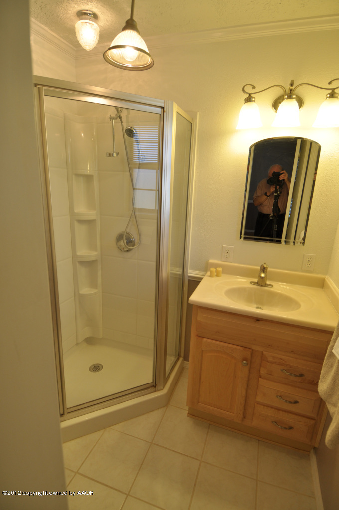 4236 Camp Lane Amarillo, TX 79110 - Photo 8 of 26 "His" bath in master bedrm