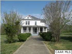 751 Main Street Dillwyn, VA 23936 - Photo 1 of 15 a front view of a house with a garden