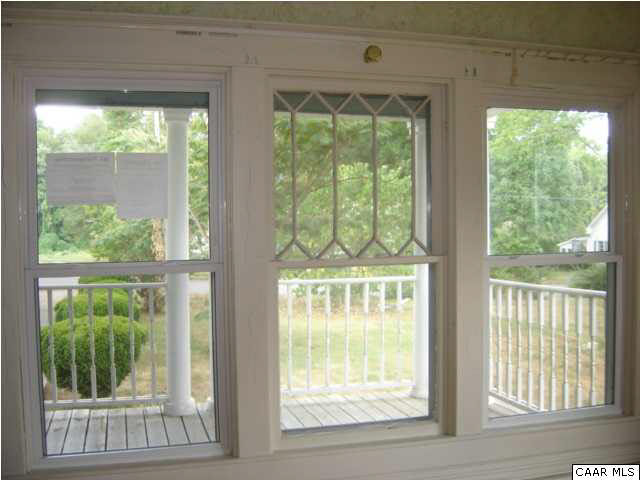 751 Main Street Dillwyn, VA 23936 - Photo 11 of 15 a view of a room that has a bed and windows