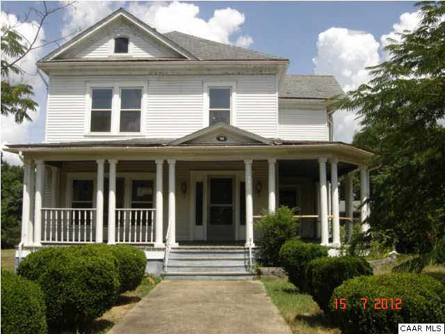 751 Main Street Dillwyn, VA 23936 - Photo 2 of 15 a front view of a house with a yard