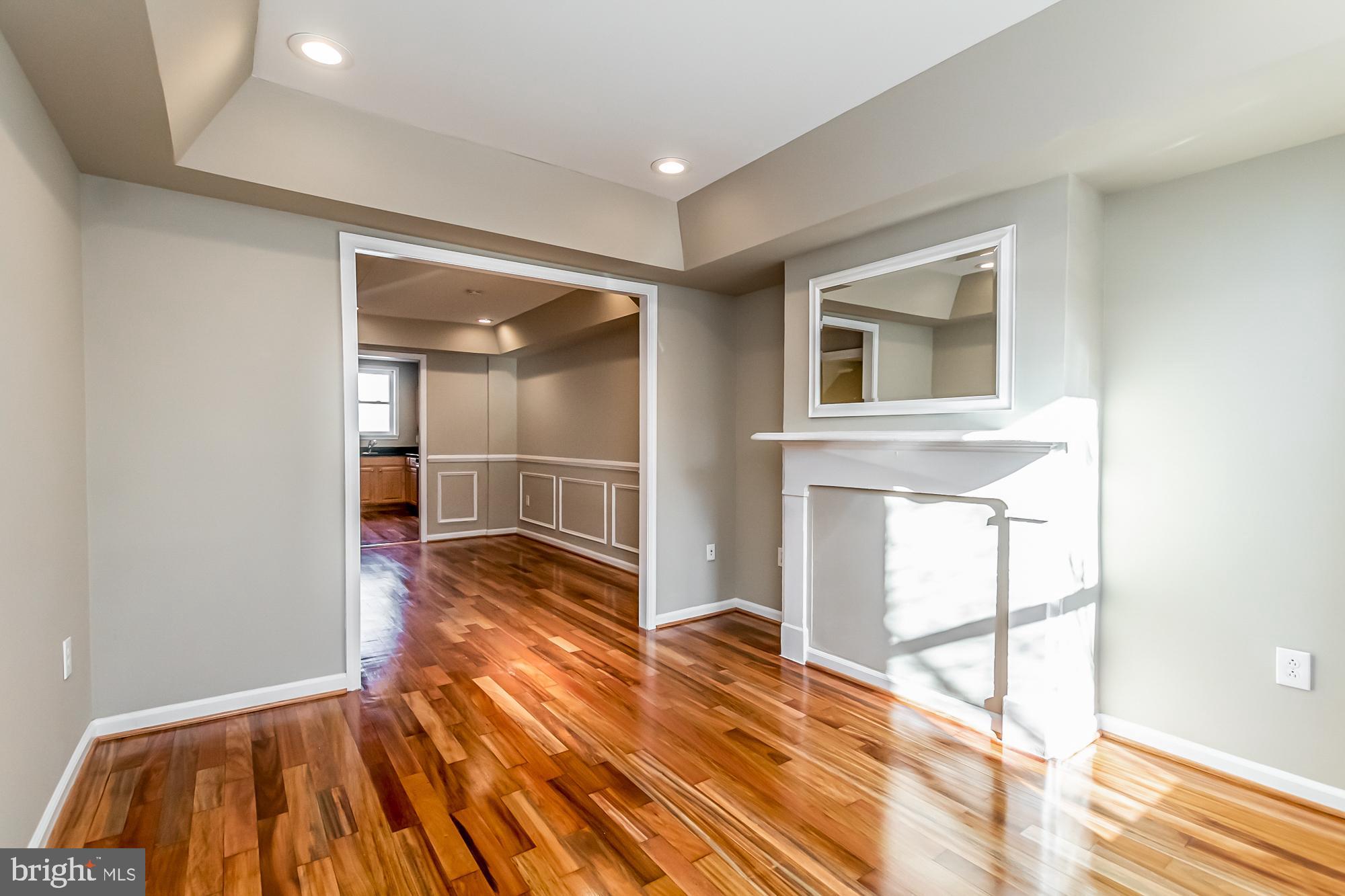 130 West Randall Street Baltimore, MD 21230 - Photo 2 of 30 a view of a room with wooden floor and door