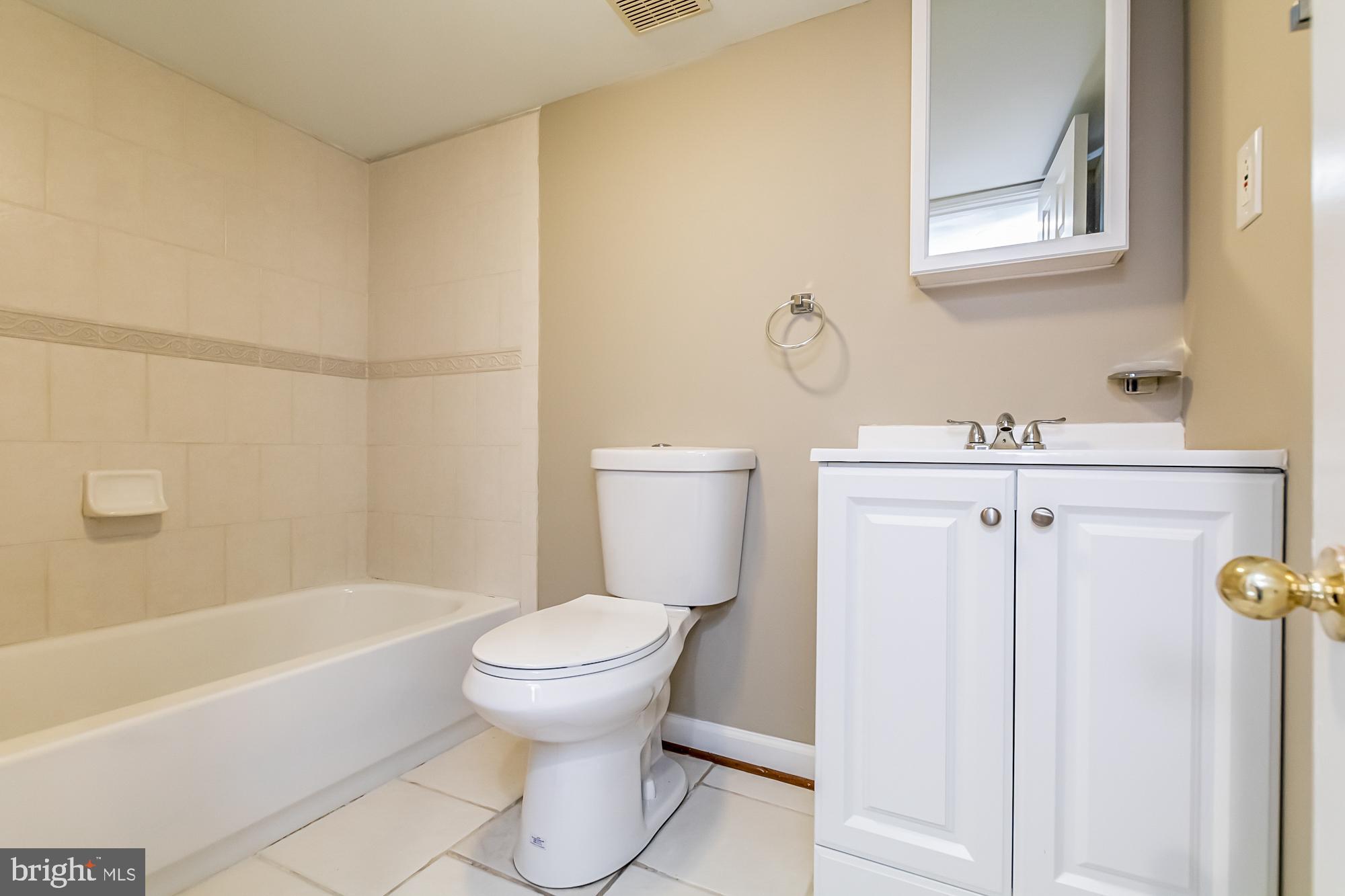 130 West Randall Street Baltimore, MD 21230 - Photo 22 of 30 a bathroom with a sink toilet and shower