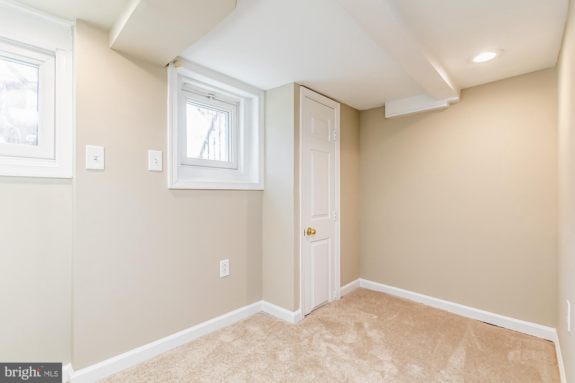 130 West Randall Street Baltimore, MD 21230 - Photo 27 of 30 an empty room with windows