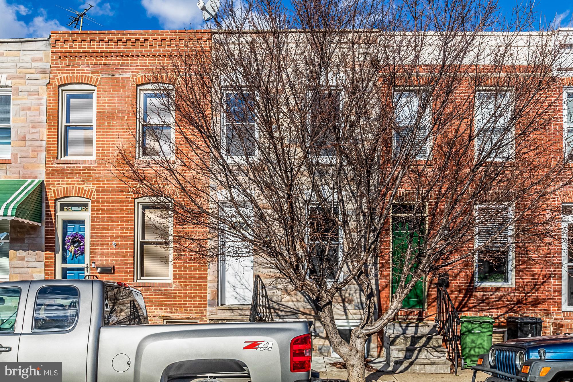 130 West Randall Street Baltimore, MD 21230 - Photo 29 of 30 a view of a building with a large tree