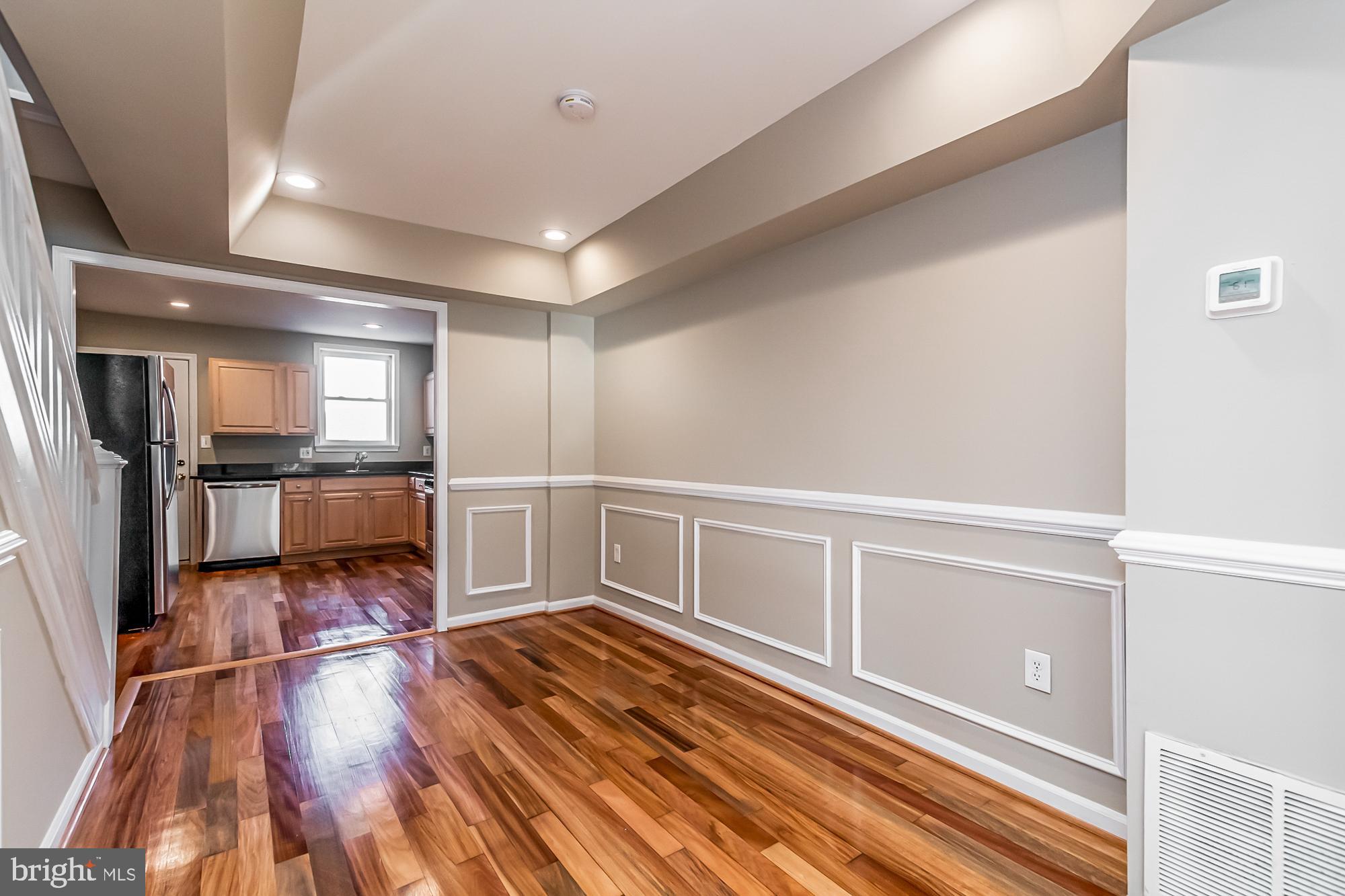 130 West Randall Street Baltimore, MD 21230 - Photo 7 of 30 a view of a living room with wooden floor