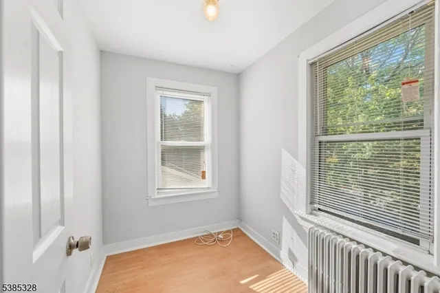 a view of a room that has a window in it