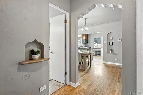 a view of a kitchen from the hallway