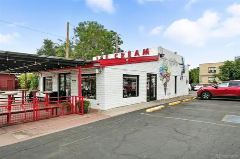 a view of a car park in front of building
