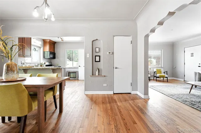 a view of a kitchen and dining room