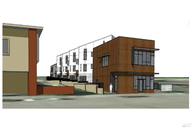 a black and white house with a outdoor space