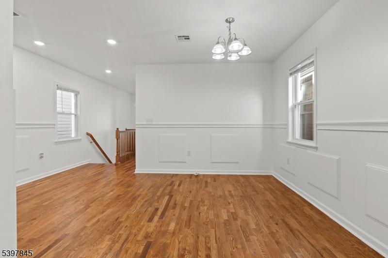 362 1/2 New Street, Unit 2 Newark, NJ 07103 - Photo 12 of 24 a view of empty room with wooden floor and fan