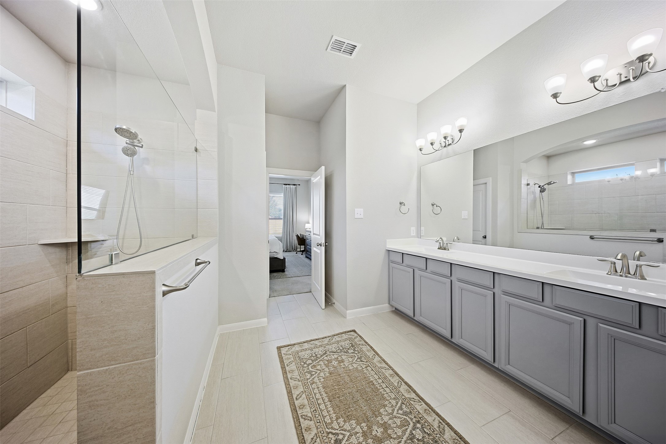 10003 Napier Drive Rosharon, TX 77583 - Photo 11 of 24 Double vanity and large shower in primary bathroom