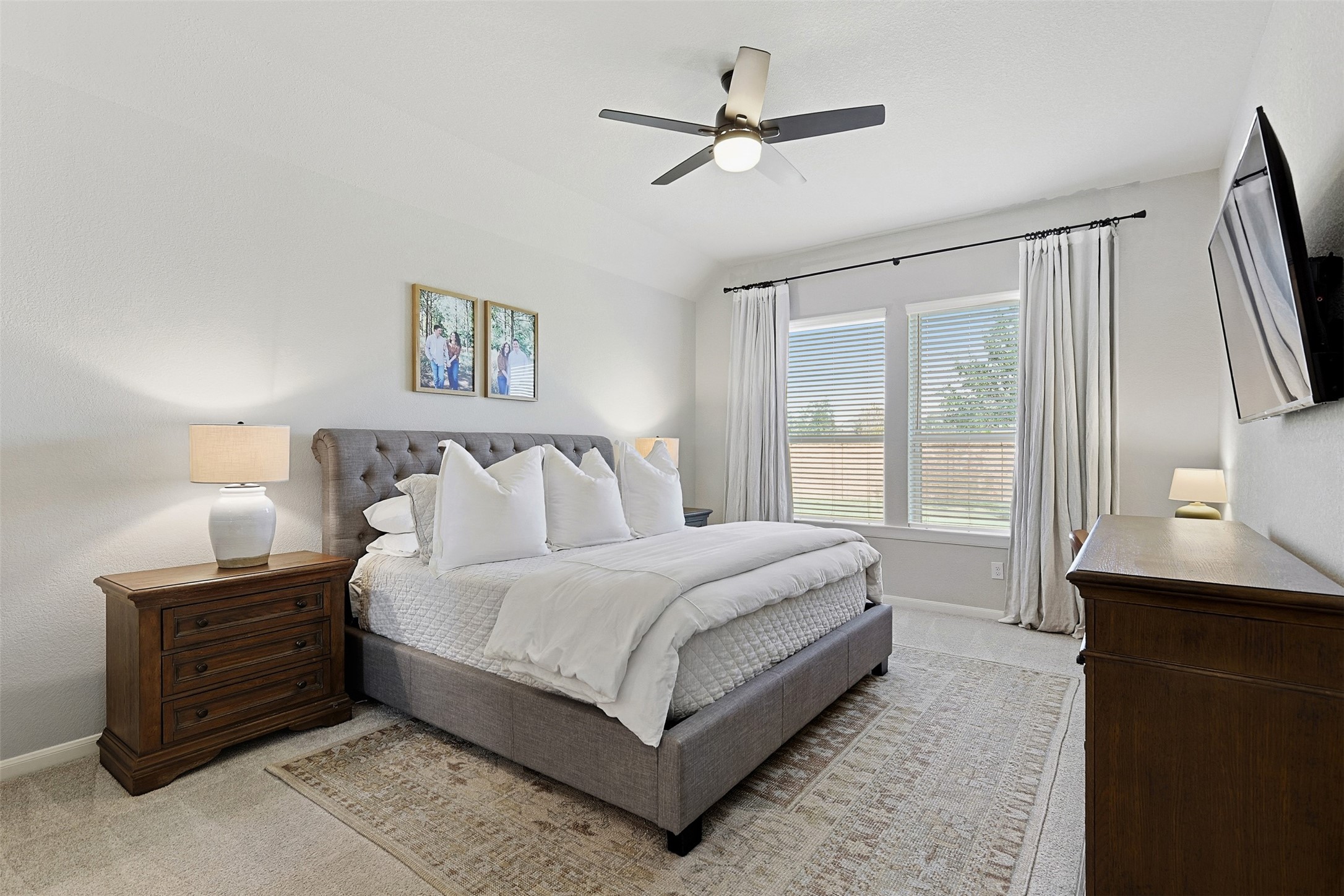 10003 Napier Drive Rosharon, TX 77583 - Photo 9 of 24 Primary bedroom with large windows overlooking expansive backyard