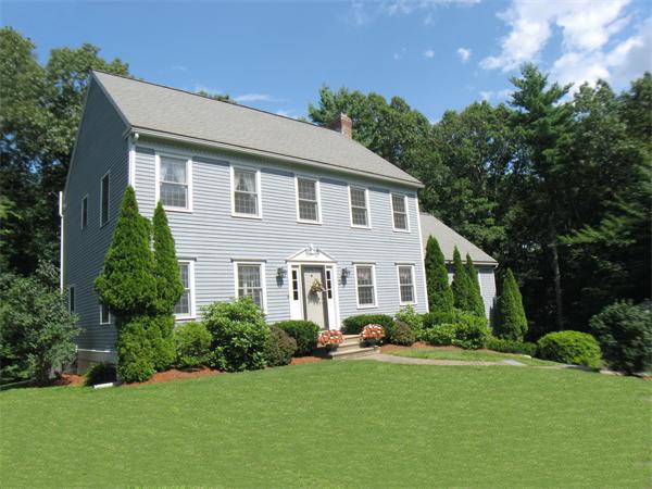 37 Patch Hill Road Boxborough, MA 01719 - Photo 1 of 22 a front view of a house with a yard