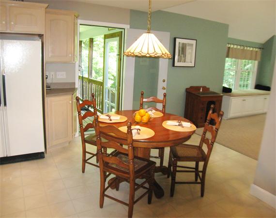 37 Patch Hill Road Boxborough, MA 01719 - Photo 11 of 22 a view of a dining room with furniture and a chandelier