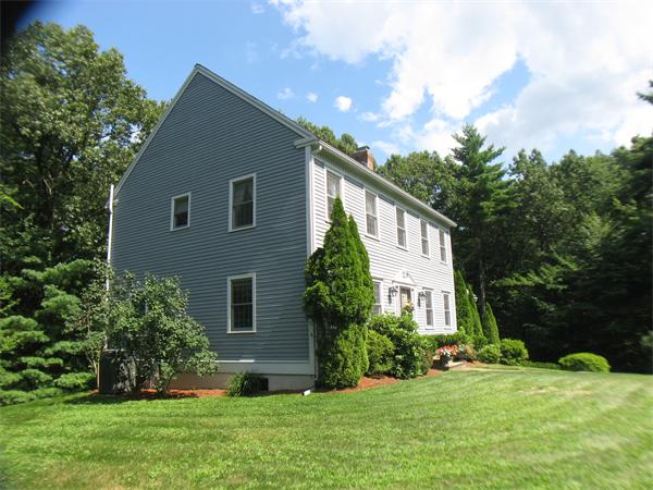 37 Patch Hill Road Boxborough, MA 01719 - Photo 21 of 22 a house view with a garden space
