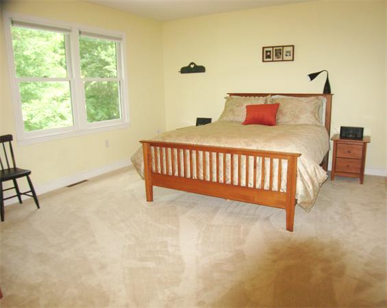 37 Patch Hill Road Boxborough, MA 01719 - Photo 7 of 22 a bedroom with a bed and a window