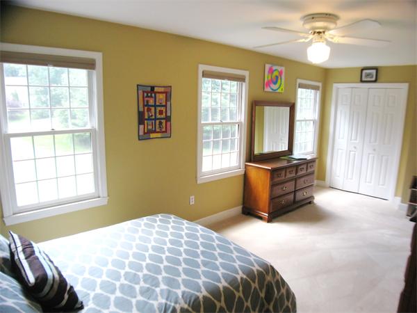 37 Patch Hill Road Boxborough, MA 01719 - Photo 8 of 22 a bedroom with a bed dresser and a window