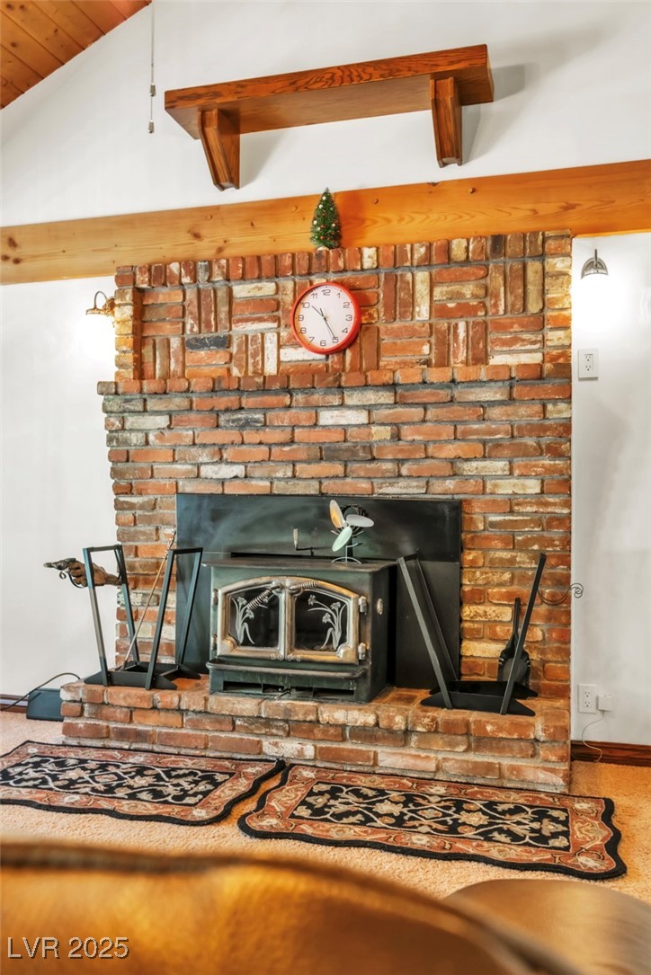 4063 Zugspitz Way Mount Charleston, NV 89124 - Photo 47 of 89 Detailed view of a wood stove and baseboards