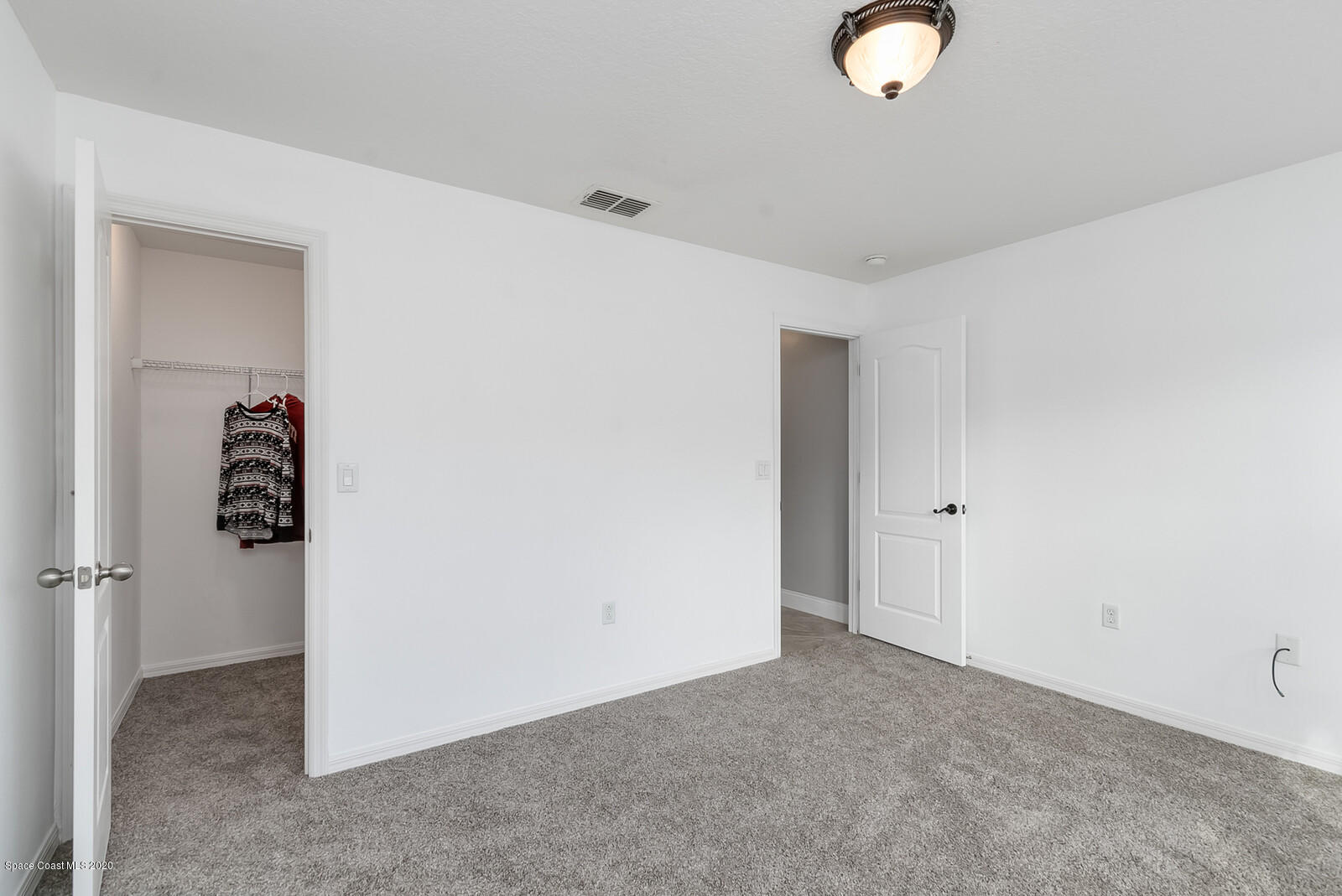 3316 Slate Street West Melbourne, FL 32904 - Photo 23 of 35 a view of a livingroom with wooden floor