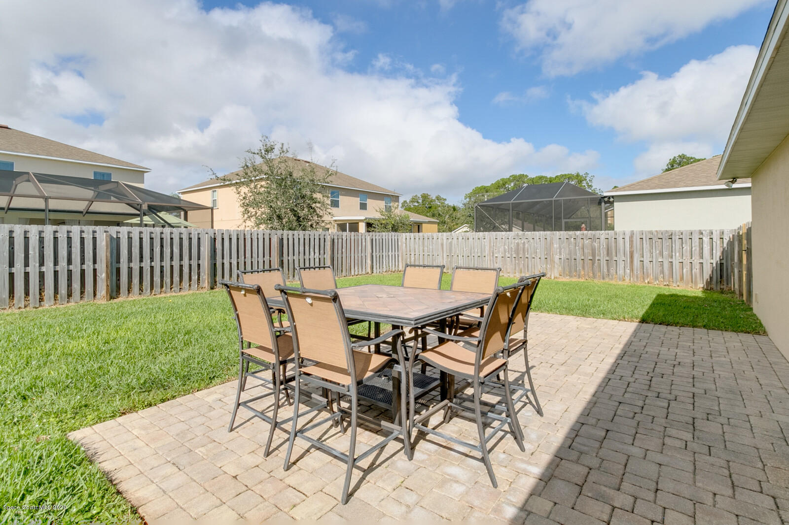 3316 Slate Street West Melbourne, FL 32904 - Photo 29 of 35 a view of a patio with a table and chairs