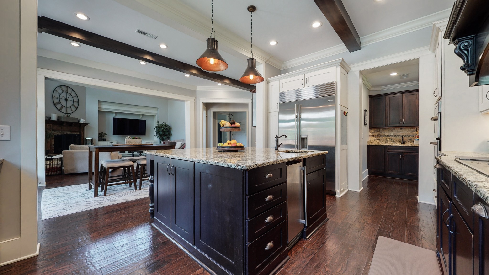 159 Coldstream Road Murfreesboro, TN 37127 - Photo 17 of 34 a kitchen with stainless steel appliances granite countertop a refrigerator a stove top oven a sink dishwasher and a dining table with wooden floor