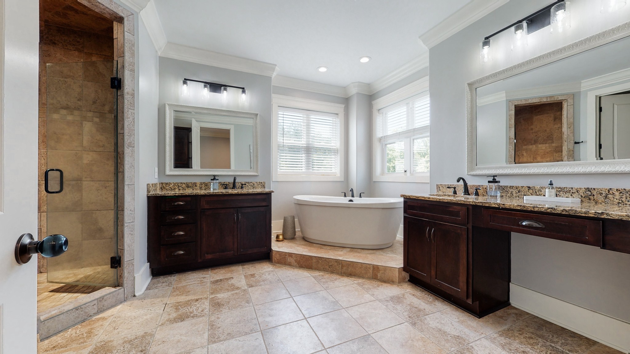 159 Coldstream Road Murfreesboro, TN 37127 - Photo 24 of 34 a spacious bathroom with a granite countertop tub sink and mirror