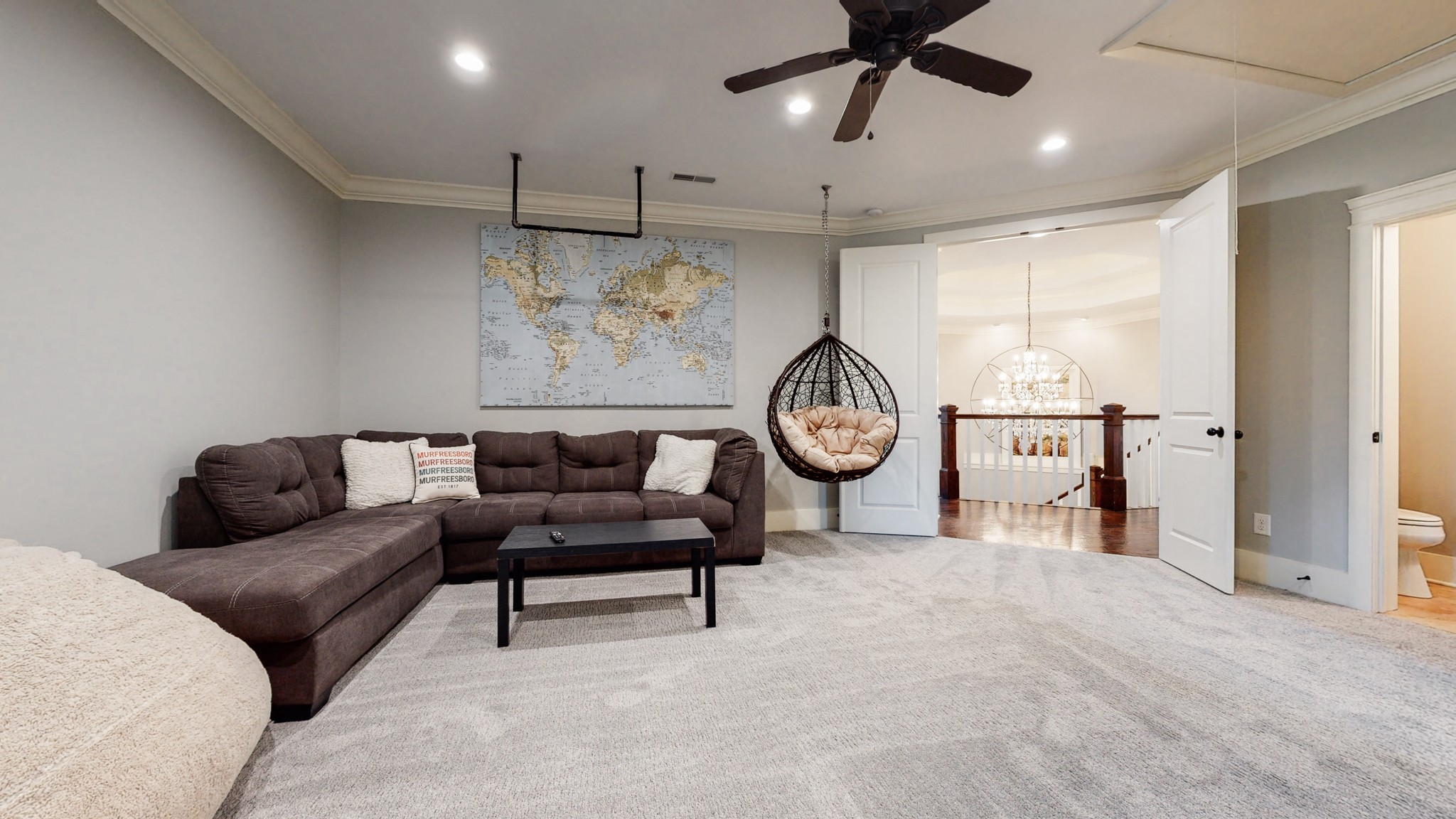 159 Coldstream Road Murfreesboro, TN 37127 - Photo 26 of 34 a living room with furniture a clock and a ceiling fan