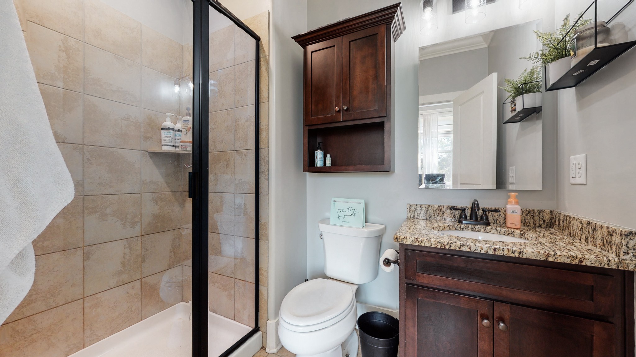 159 Coldstream Road Murfreesboro, TN 37127 - Photo 32 of 34 a bathroom with a granite countertop sink a toilet and a mirror