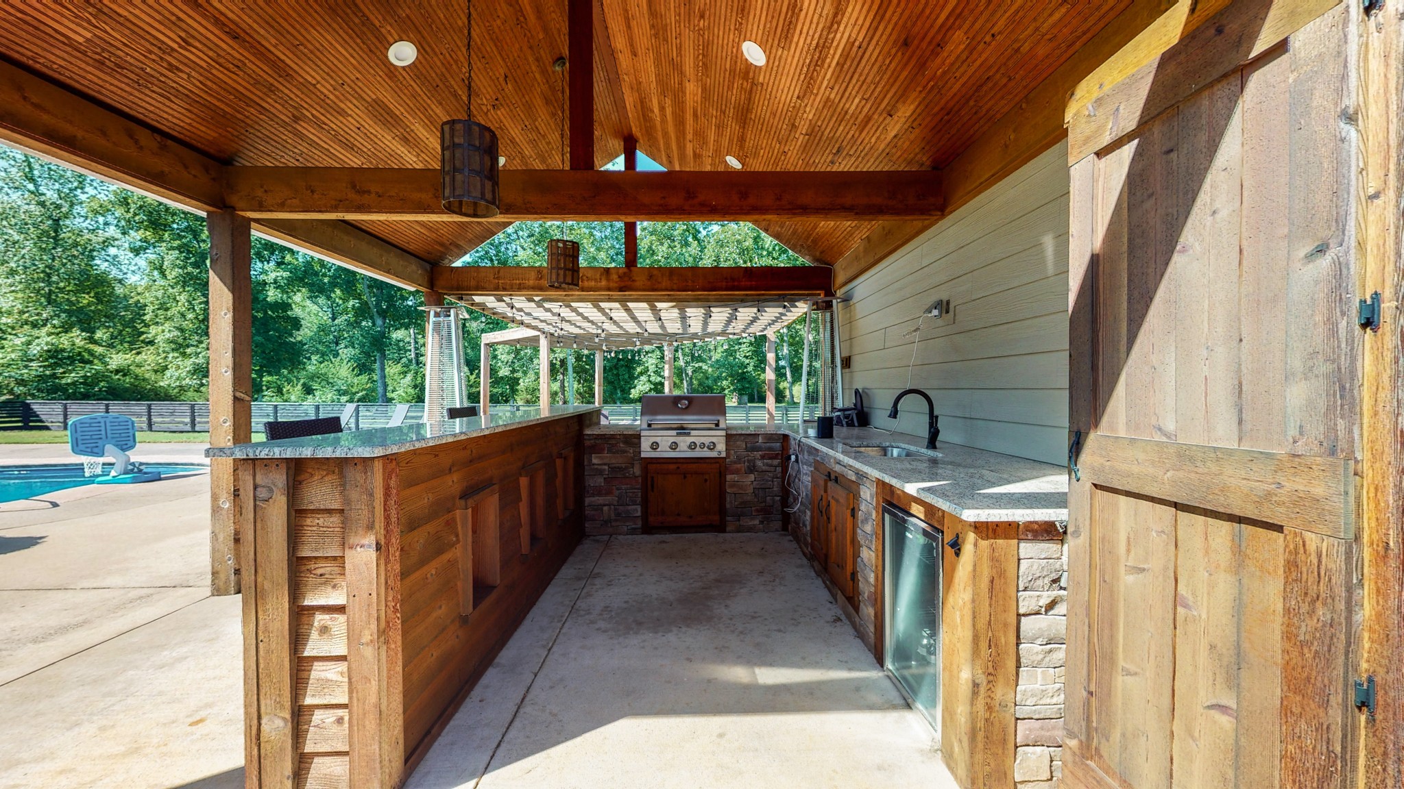 159 Coldstream Road Murfreesboro, TN 37127 - Photo 7 of 34 a kitchen with stainless steel appliances wooden cabinets and a large window
