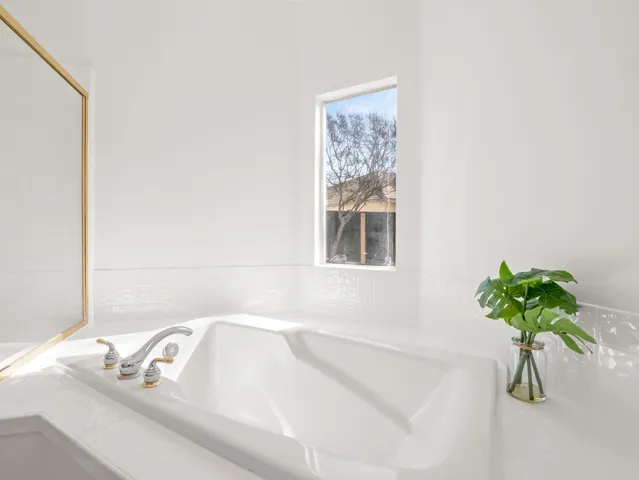 a bathroom with a bathtub
