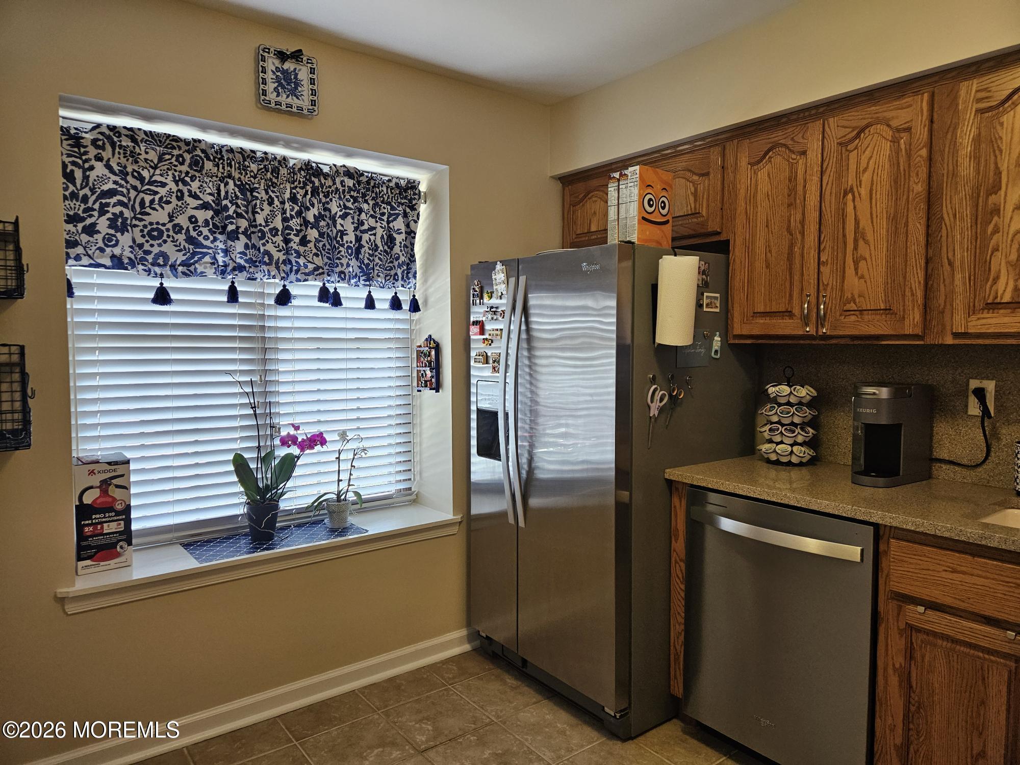 33 Balmoral Court Matawan, NJ 07747 - Photo 5 of 20 a kitchen with stainless steel appliances granite countertop a refrigerator and a stove
