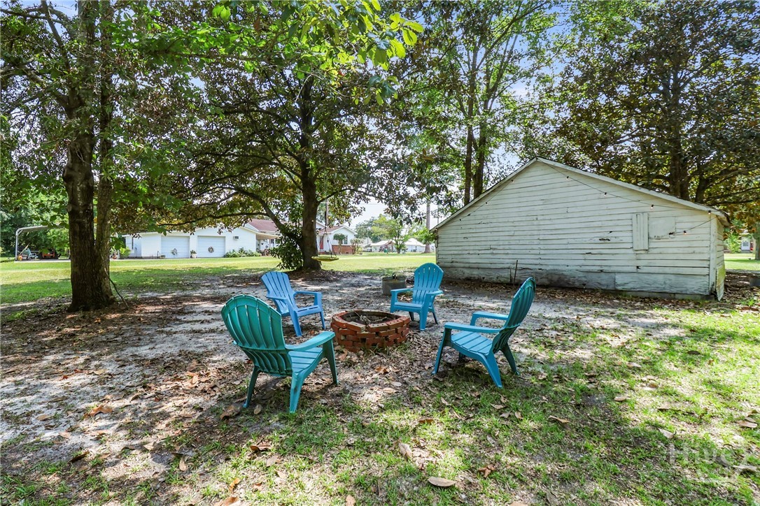702 Lexington Avenue Rincon, GA 31326 - Photo 26 of 28 Fire Pit in Back yard
