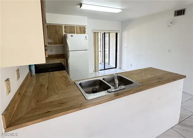 $1,140 | 1640 Orchid Boulevard, Unit 102, Cape Coral, FL 33904