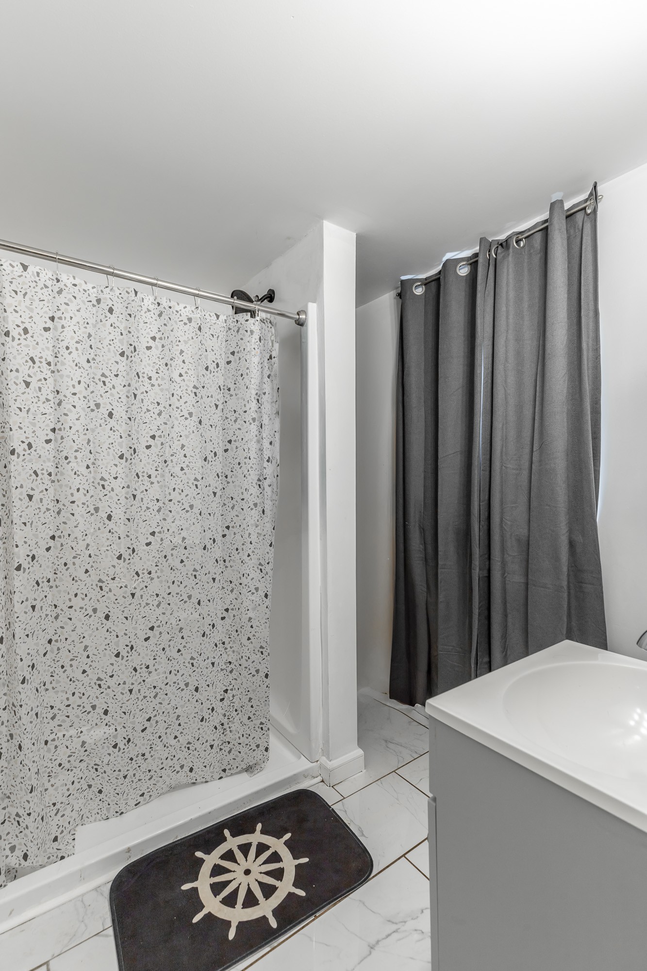 407 Colville Street Chattanooga, TN 37405 - Photo 42 of 50 a bathroom with a shower and a sink