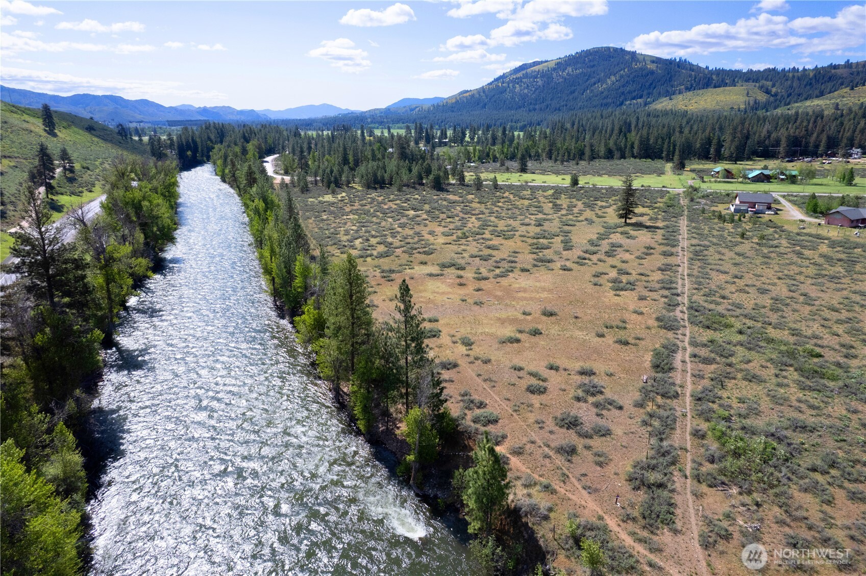 0 Wolf Creek Road Winthrop, WA 98862 - Photo 13 of 40 a view of a street with a yard