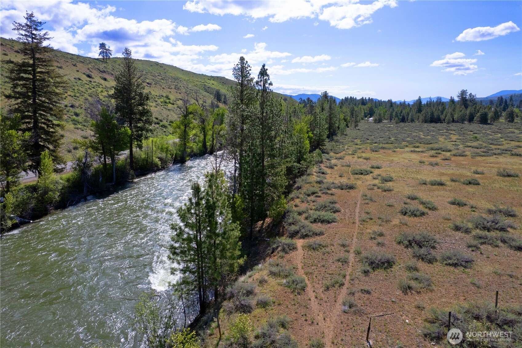 0 Wolf Creek Road Winthrop, WA 98862 - Photo 14 of 40 a view of a pathway with a garden