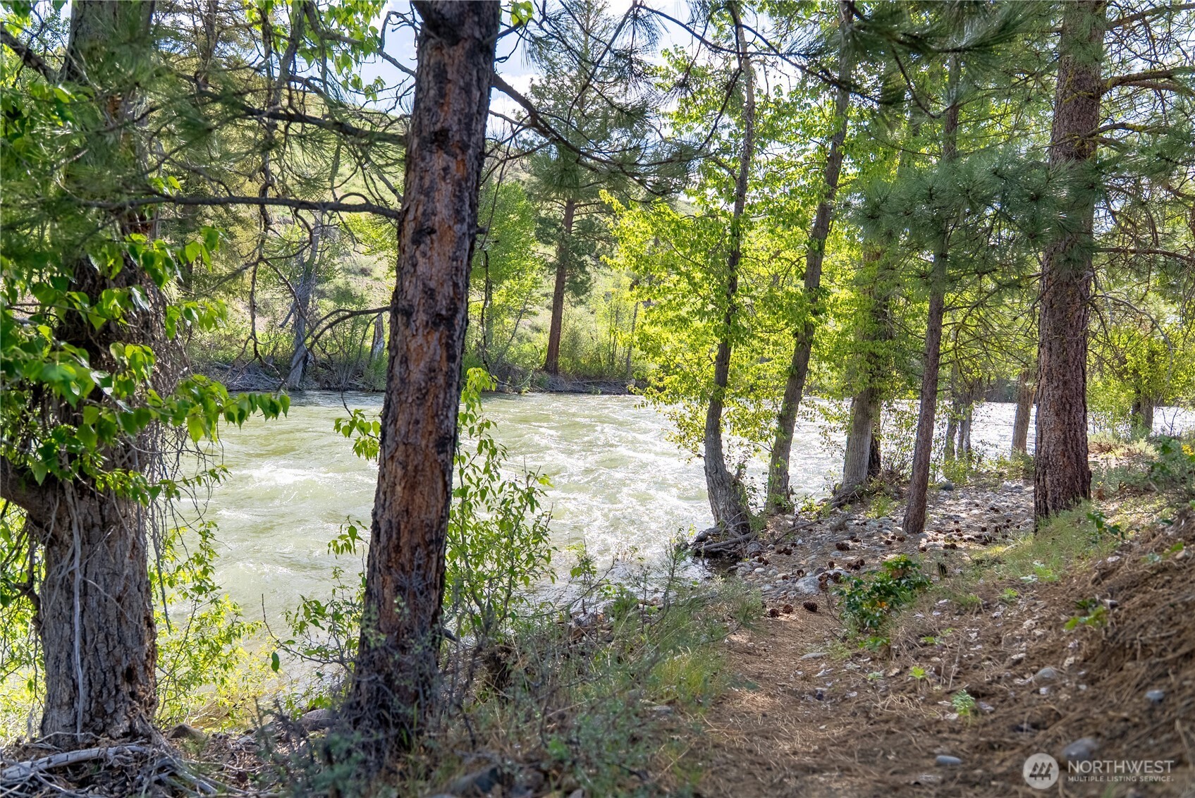 0 Wolf Creek Road Winthrop, WA 98862 - Photo 33 of 40 a backyard of a house with lots of green space