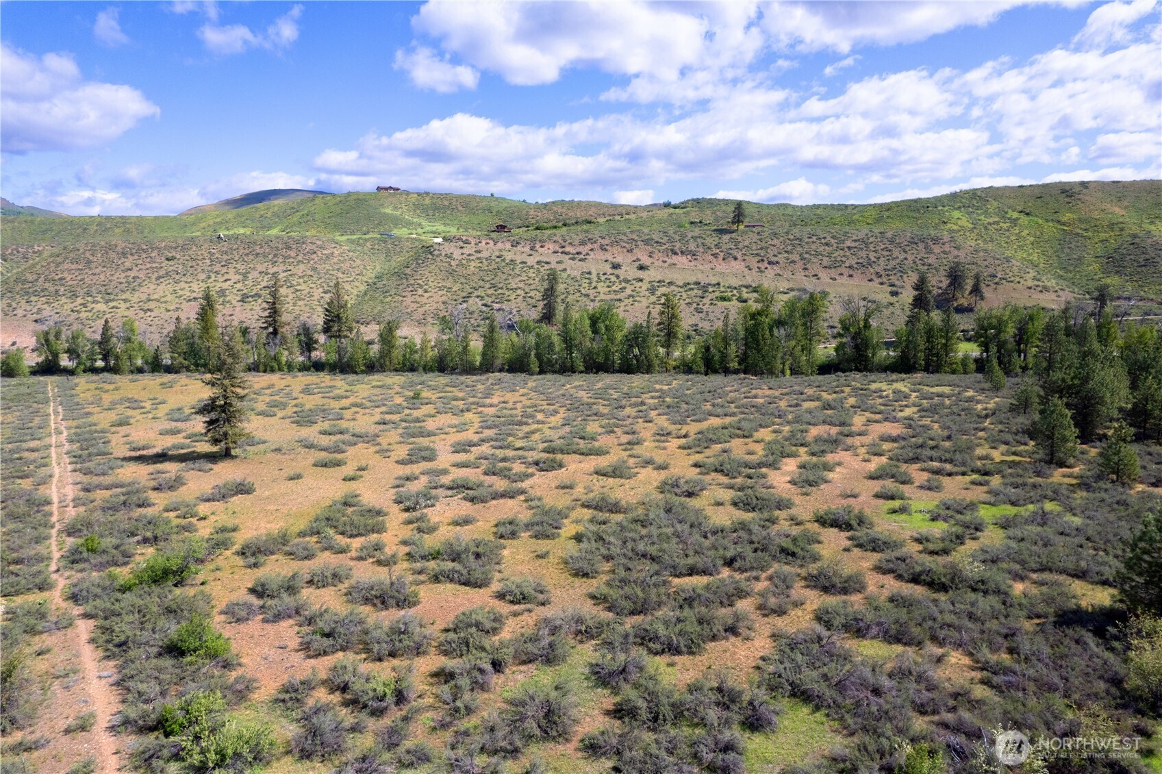0 Wolf Creek Road Winthrop, WA 98862 - Photo 7 of 40 a view of lake with mountain